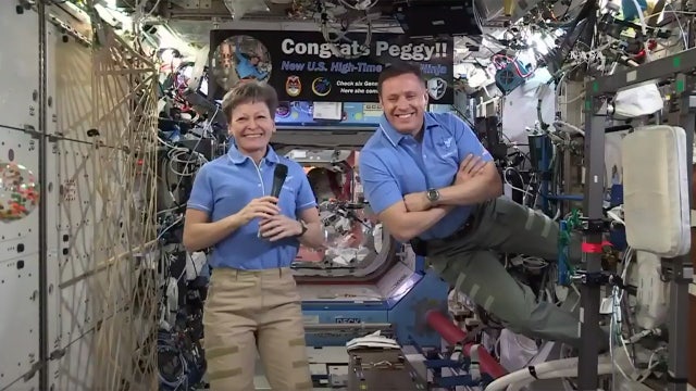 Astronaut breaks record for most time in space by American