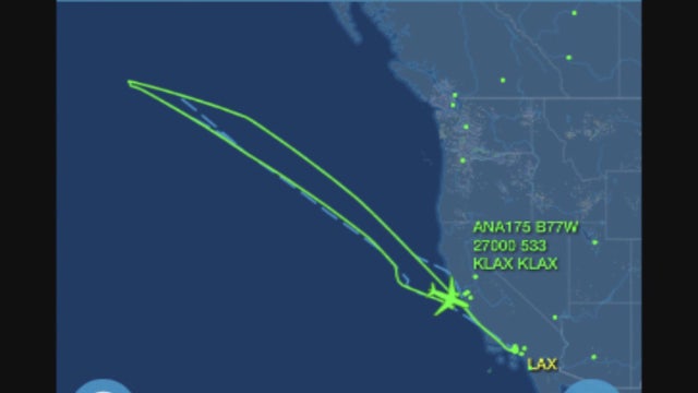 Tokyo-bound flight returns to LAX due to unauthorized person on plane