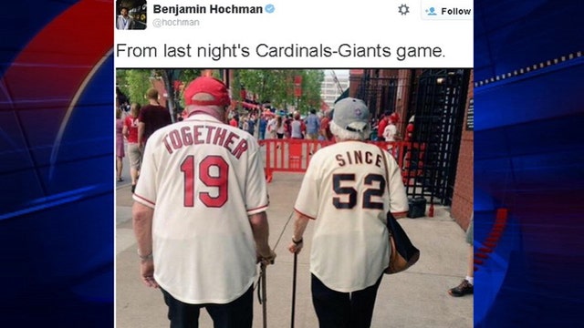 Elderly couple displays true love despite rooting for different baseball teams