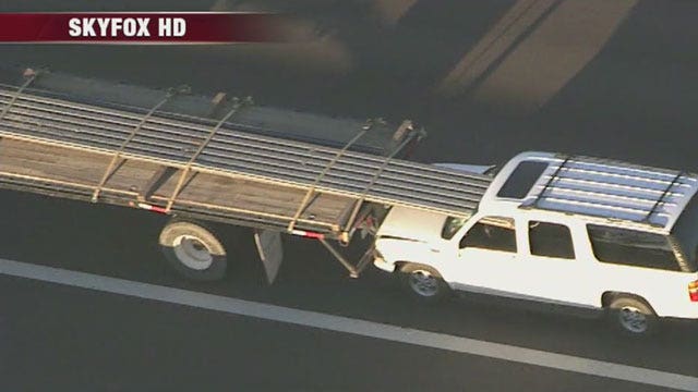 Driver expected to survive after metal smashes through SUV's windshield