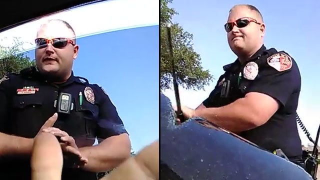 VIDEO: Officer smashes window after driver repeatedly refuses to comply