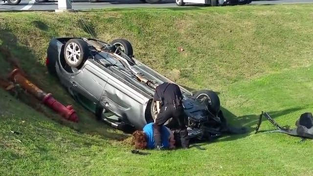 Woman does donuts at intersection, hits passersby and officers' vehicles