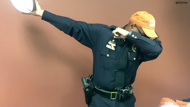 DPD's Chief Brown Dabs with Longhorns ball