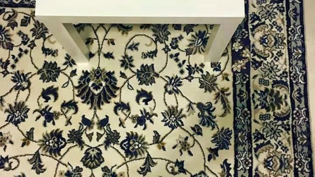 Woman drops phone on carpet, perplexes entire internet