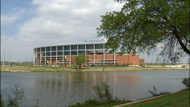 Baylor official charged with misdemeanor assault on reporter