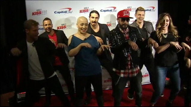 Woman behind viral dance video attends Jingle Ball concert as special guest