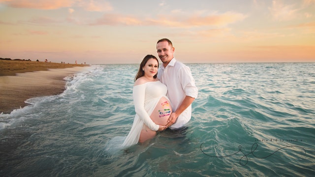 Couple celebrates rainbow baby while beautifully honoring child they lost