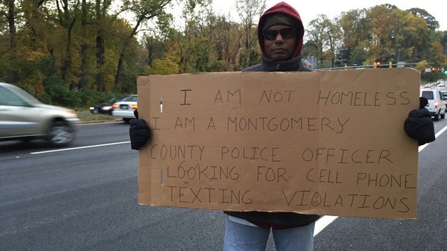 Police use officer disguised as homeless man to catch drivers texting behind the wheel