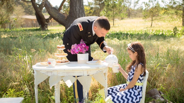Photographer catches special moments between military dads, daughters