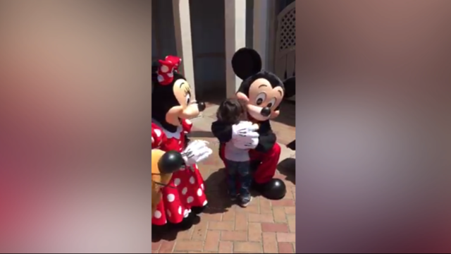 Disney characters sign 'I love you' to deaf boy