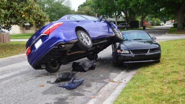 Teens steal car, leave it parked atop neighboring car