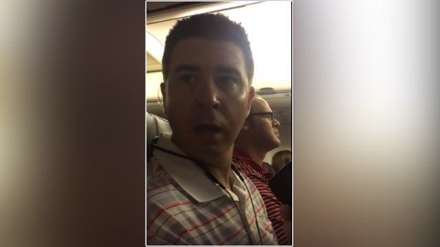 Wife enlists flight crew's help to tell husband she's pregnant