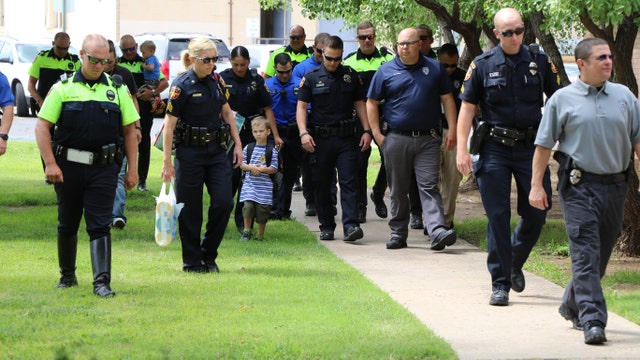 Healing Hugs: Texas police surprise slain officer's kids on first day of school