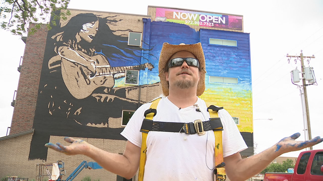 Blind artist painting 4-story mural in Dallas