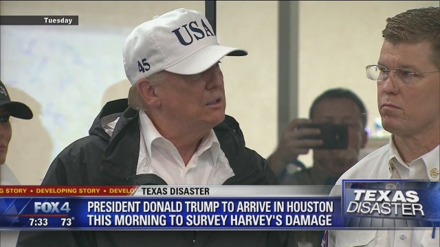 Upbeat Trump pitches in at shelter for Harvey victims