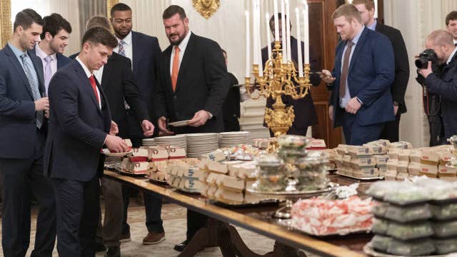 Lovin' it: Trump fetes champion Clemson with burgers, fries
