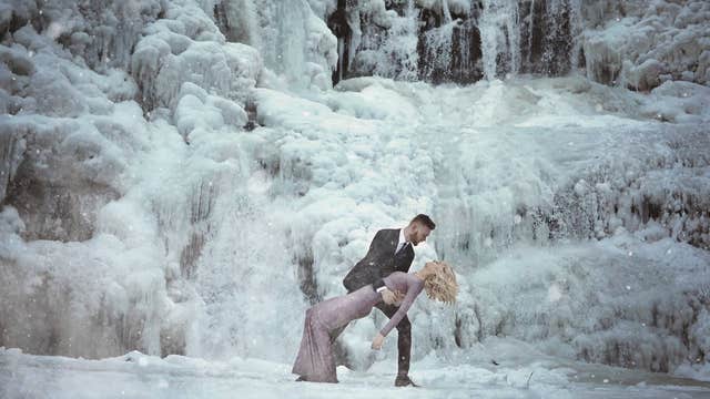 Tennessee couple takes engagement photos by frozen waterfall and it's magical