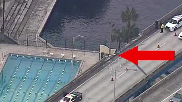 Garbage truck plunges off Florida overpass