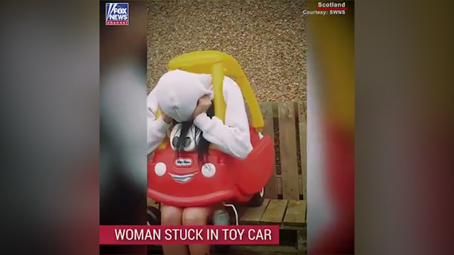 Woman gets stuck inside cousin's toy car