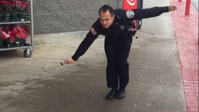 WATCH: Dancing cop raises money for a good cause, spreads holiday cheer
