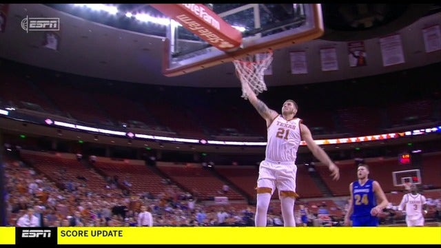 Osetkowski leads Texas over S. Dakota St. 79-73 in NIT