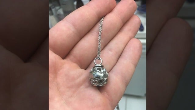Florida man searching for owner of necklace filled with ashes found on beach