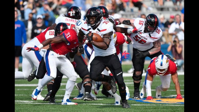 Nisby rumbles for 4 TDs, Texas Tech pounds Kansas 65-19