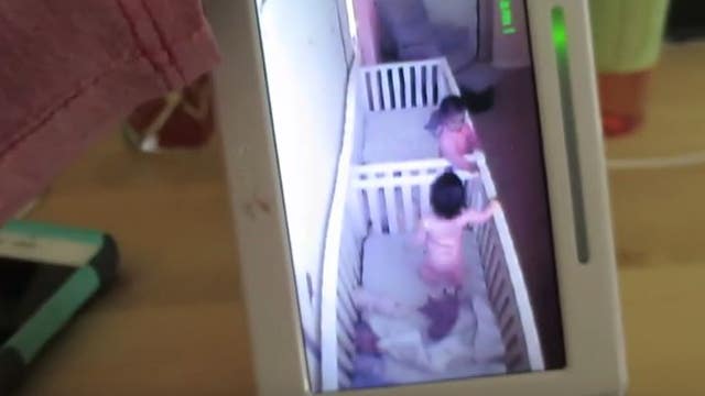 Twin babies pretend to sleep