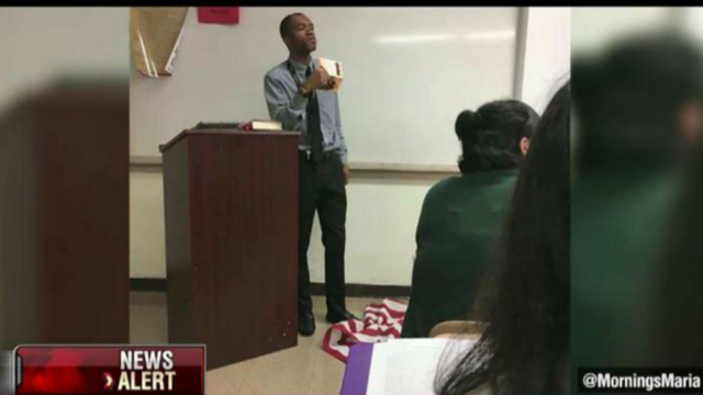 Teacher stomps on American flag during class