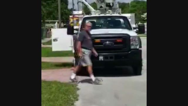 WATCH: Man shoots AT&T truck tires, grille