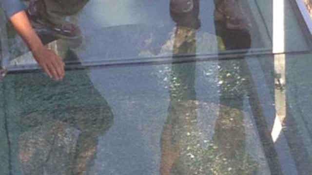 Glass bridge 3,540 feet high cracks in China
