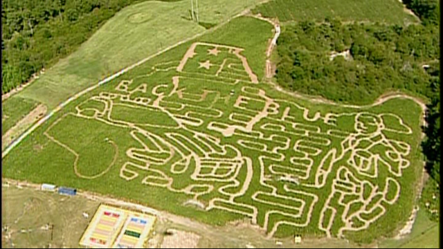 Workers cut Loganville corn maze honoring law enforcement, first responders