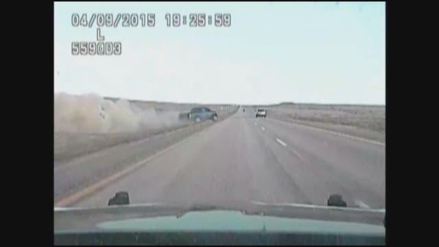 WATCH: Suspect flees after being thrown from rolling truck