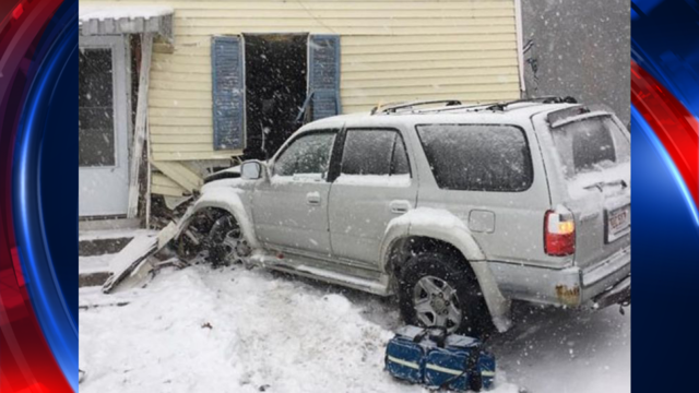 Video shows SUV crashing into house during NH snowstorm