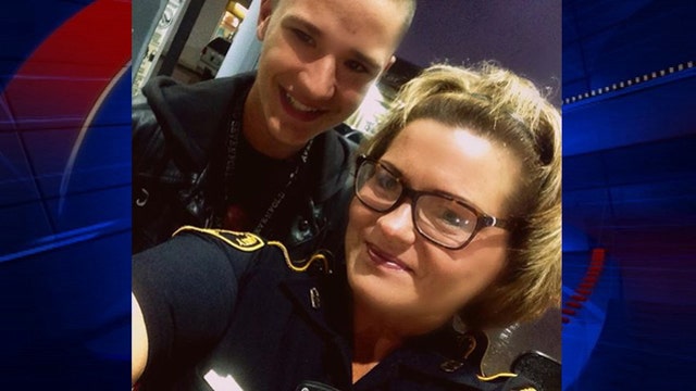 Texas teen stands guard for deputy at gas station