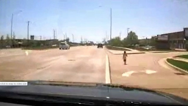 Naperville officer rescues young boy running on Route 59