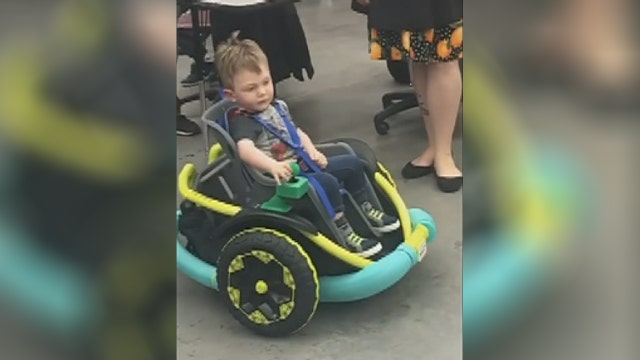 High school robotics team builds powered wheelchair for 2-year-old