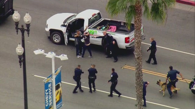 Pursuit of stolen U-Haul ends with standoff (and a kiss) before arrest