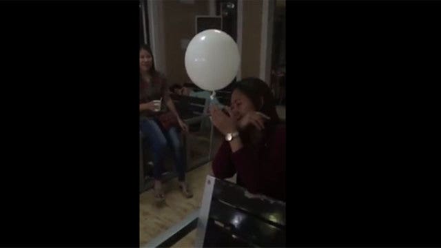 Balloon floats from son's coffin to grieving mom