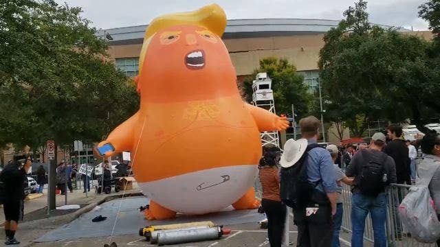'Baby Trump' balloon appears in Houston outside of MAGA rally