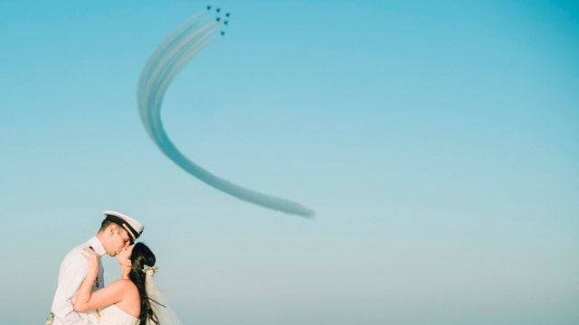 Now that's a photobomb: Blue Angels star in couple's beach wedding photos