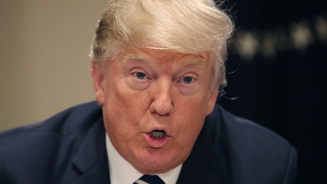 Trump talks tougher, now says he warned Putin on meddling
