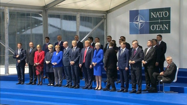 Trump rattles NATO, questioning its value, assailing Germany