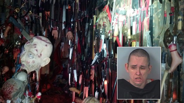 Deputies: Woman charged at officer in home filled with knives