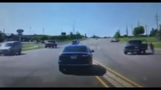 Man jumps into moving car to save driver having a seizure