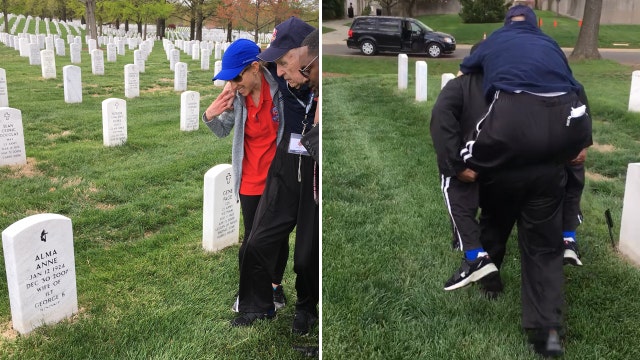 WWII veteran overwhelmed by kindness, carried by Arlington National Cemetery worker to wife's grave