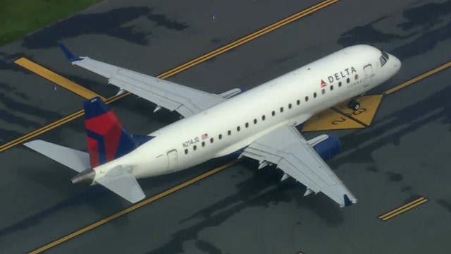 Screaming woman tried opening door on jet mid-flight, passengers say