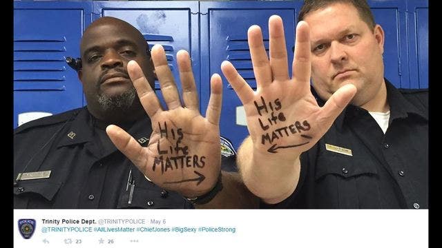 Texas officers say 'His Life Matters' in viral photo
