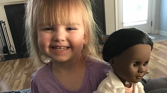 Photo of toddler who defends her choice of doll goes viral