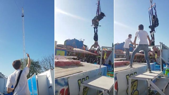 WATCH: Woman dangles from swinging ride after ride malfunctions